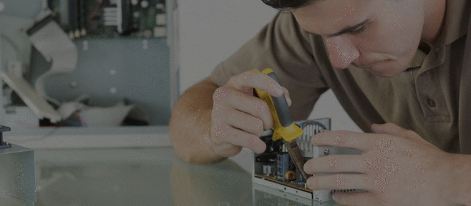 Engineer working on circuit board