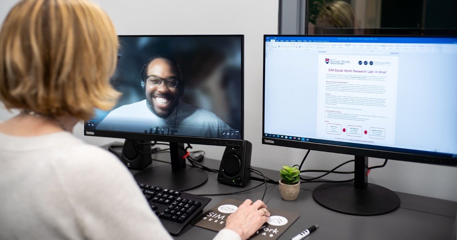 Professor working in Carleton's SIM lab