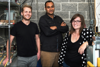 3 grad Engineering students in lab