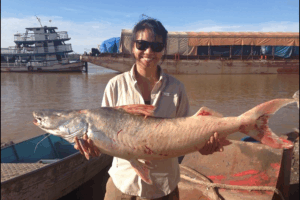 Nguyen with a catfish