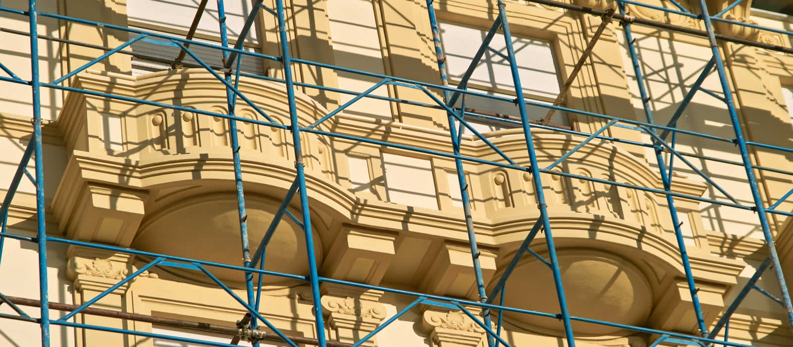 Scaffolding on the facade of a late 19th century Italianate building