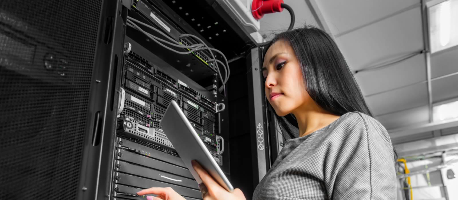 Woman working on computer hardware