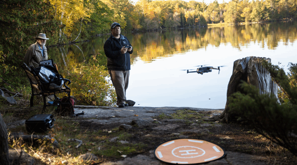 Researchers with a drone